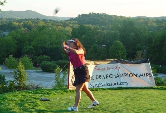 Mary Lou Nicolleti hits 208-yard drive to win Women's Division.