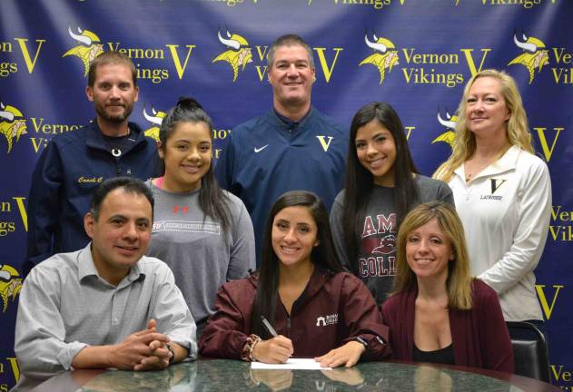Senior Brianna Garcia will continue her education and lacrosse career at Ramapo College next fall. Pictured with Brianna are her two sisters and mom and dad. Head Coach Carlson, AD Bill Foley and Assistant Coach Hollyce Schoepp
