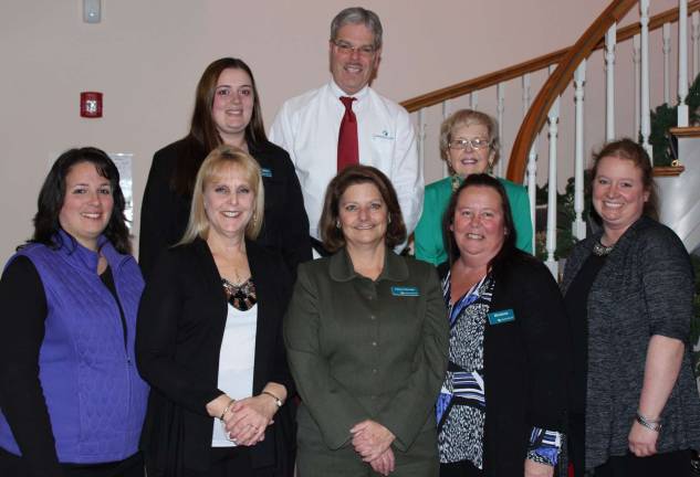 Photo provided President and CEO Tom Shara (back row) stands with colleagues celebrating 10 years of service with Lakeland Bank. Standing in the back row (from left): Mary Miller and Helen Malady. Front: Jennifer Morciglio, Kathy Picun, Nancy Norman, Marianne Carter, and Maureen Kennedy. Not pictured: Regina Major, Julie Mulligan, and Linda Riker.