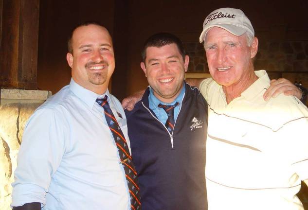 Putting Contest winner Bob Mosier is shown with CS Staffers Tom Dyer and Event Coordinator Matt McGarry.