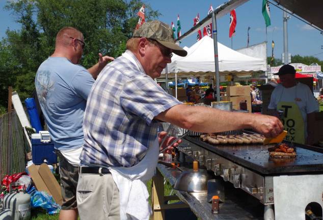 Volunteer cooks from Jefferson&#xfe;&#xc4;&#xf4;s Woodstock Sportsman organization offered a variety of all American grilled food.
