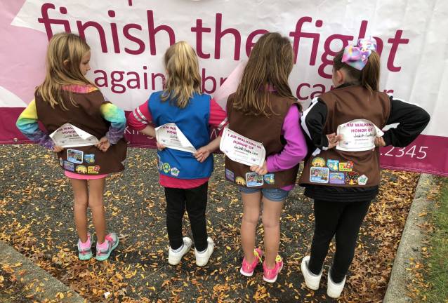 Girl Scouts participate in breast cancer walk