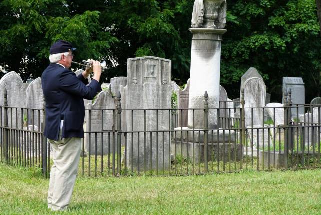 Jeff Heagy, of Bugles Across America, plays taps at the Memorial Service for Civil War Soldiers.