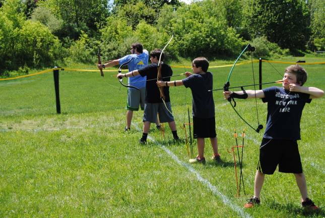 Scouts help build YMCA's archery range