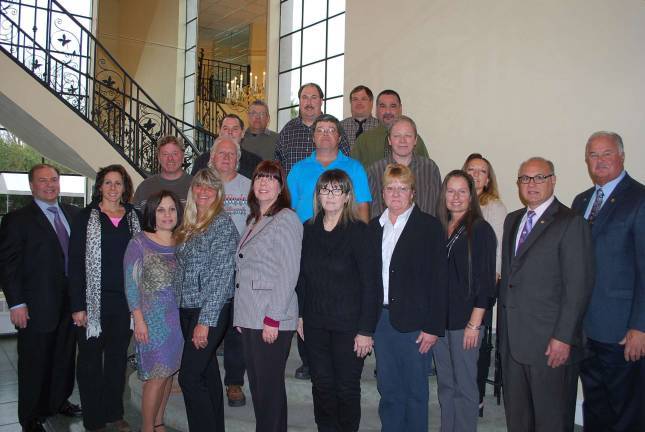 RoNetco Supermarkets honors longtime associates RoNetco Supermarkets' employees with 25 years experience are: back, from left, Charles Lombaerde, Kevin Sarnowski, Howard Bird; third row, from left, Michael Hatsko, Salvatore Pannella; second row, from left, Joseph Dario, Edward Baton, Alan Genung, David Scabet, Irene Sisco.They are shown with Vice President and chief financial officer David P. Romano, left, Vice President and C.O.O. Dominic J. Romano and General Manager Hank Ramberger