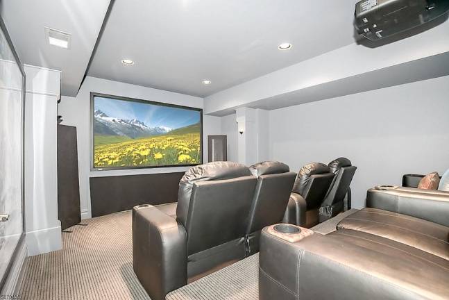 Home on five manicured acres has pool, movie theater Home on five manicured acres has pool, movie theater