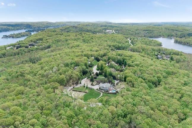 Home on five manicured acres has pool, movie theater Home on five manicured acres has pool, movie theater