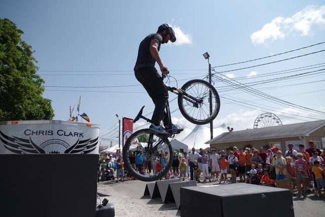 Hype on a Bike Photos by George LeRoy Hunter Stuntman Chris Clark jumps his bike.