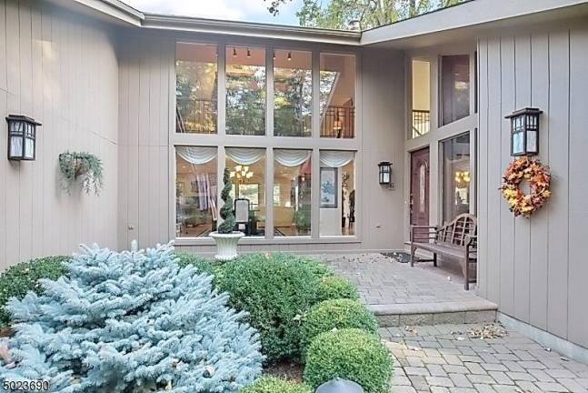 This gorgeous, move-in ready home on Lake Mohawk has it all