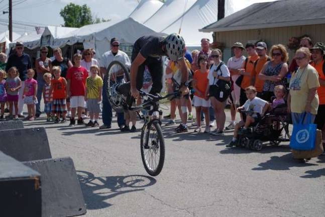 Hype on a Bike Clark holds the crowds attention performing.