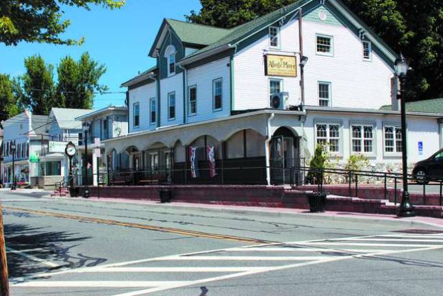 The Atlantic Manor debuts new sidewalk, benches and on-ramp.