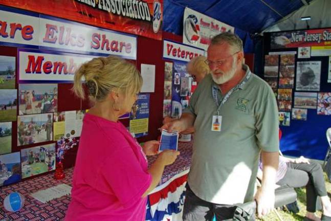 Rick Boydston of Vernon spent much of the day working in the Sussex Elks booth.