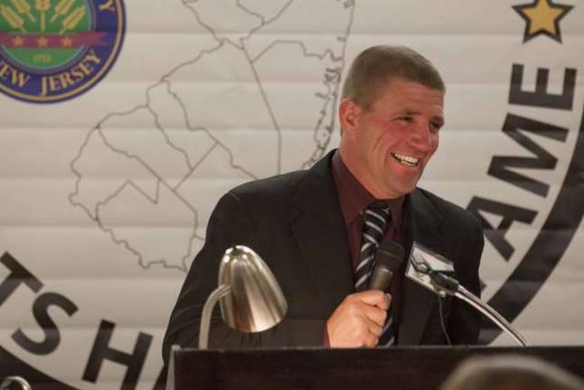Steven Dalling smiles and speaks briefly during the ceremony after being inducted into the Sussex County Sports Hall of Fame Class of 2014.