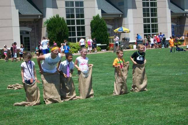 Wallkill Valley HS FBLA members complete project The old-fashioned potato sack race was a hit at the Breakaway Camp Carnival.