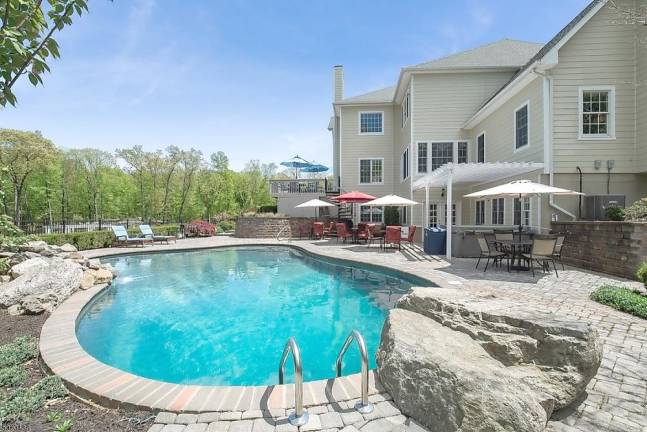 Home on five manicured acres has pool, movie theater Home on five manicured acres has pool, movie theater