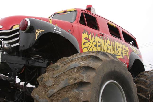 Monster truck event collect toys for local children Monster truck rides at the Chatterbox toy drive took guests out into the corn fields spinning donuts all in good fun.
