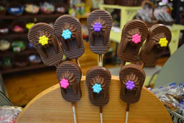Candy Apple Shoppe offers delectable apples and confections Flip flop shaped chocolates.
