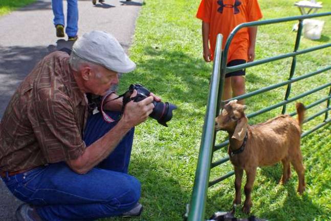 Hamburg photographer Ernest Duck spent part of the afternoon taking photos of a variety of small farm animals with a special focus on goats and chickens.