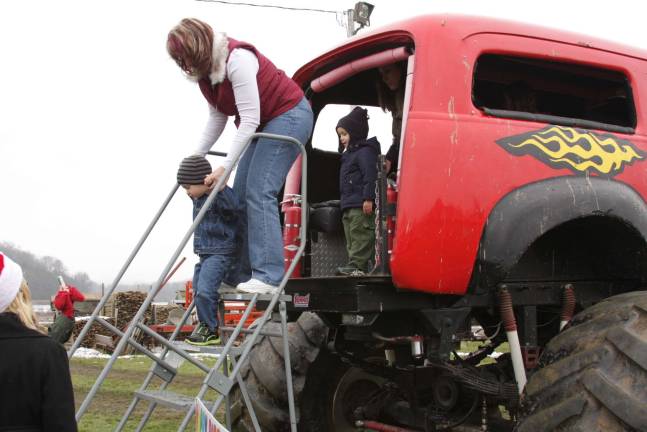 Monster truck event collect toys for local children Sharon and Chase Donnelly of Wantage