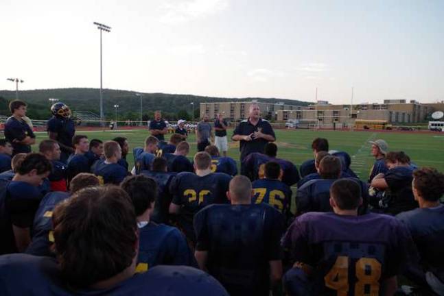 Vernon Township High School varsity football head coach Chuck Tepper talks to the Vikings.