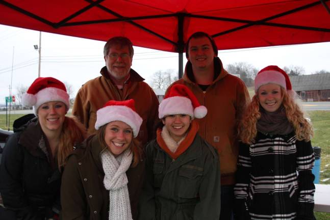Monster truck event collect toys for local children Whitney Flotard, Jenna Banfield, Don Hall, Tom Dolan, Elise Weingartner, Nichole Hoeni - volunteers from the Chatterbox for the toy drive.