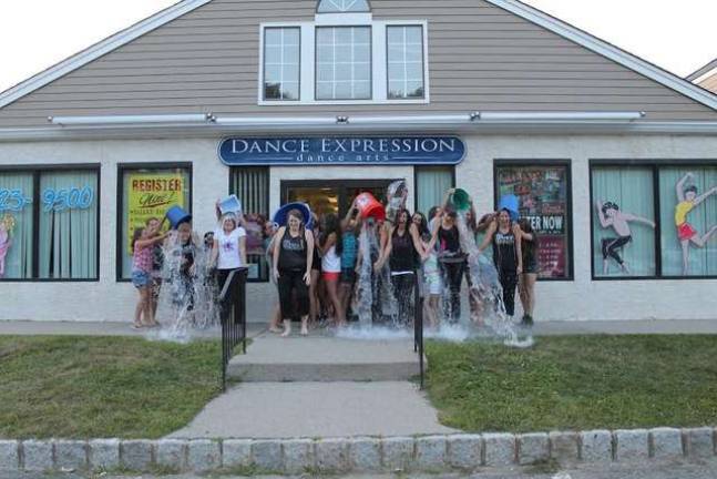 The Staff of Dance Expression Dance Arts in Hamburg participated in the &quot;ALS Ice Bucket Challenge&quot; on Aug. 19 to raise money and awareness for the ALS organization. Seven staff members were &quot;iced&quot; by Dance Expression Dance Arts students. Donations to the fund drive can be made at www.alsa.org.