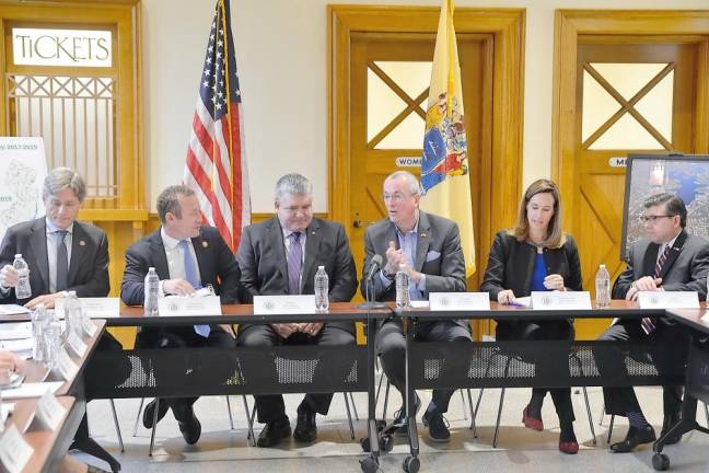 New Jersey Gov. Phil Murphy, thrird from the right, meets with members of congress and other local officials in Landing on Monday to announce his initiative to combat Harmful Algal Blooms.