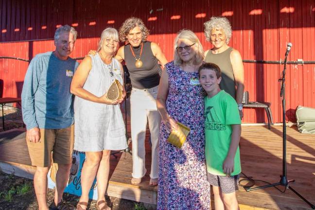 Local gardeners win props for their crops at Kitchen Garden Tour April Perciballi and her gardening-sidekick grandson tied for second place with Bob and Kathy Linguanti for best garden. Left to right: Bob and Kathy Linguanti, Dirt Editor and Publisher Becca Tucker, April Perciballi and her grandson, Straus News Publisher Jeanne Straus. Photo: Aja Brandt
