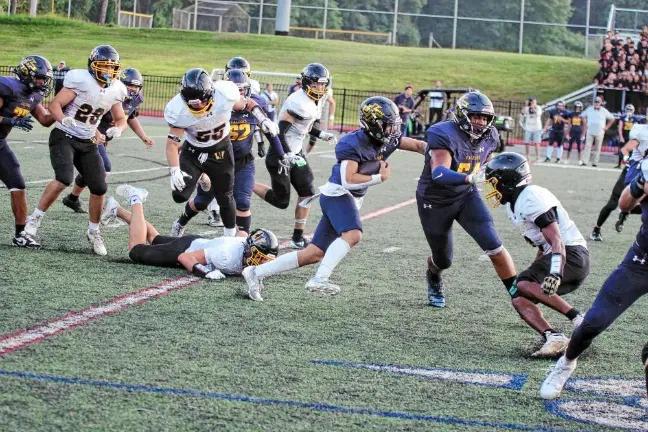 Football preview: Falcons should benefit from experience, coach says Jefferson ball carrier Braedan Cummings finds some running room in a game against West Milford last fall. (File photo by George Leroy Hunter)
