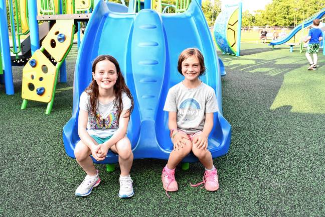 Inclusive playground opens Maggie Weber and Maguire Pinkman. (Photo by Maria Kovic)