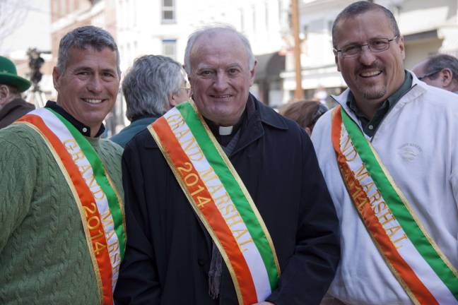 2014 Grand Marshals Sean McGuire, Father Bill Collins, and Mike McGuire.
