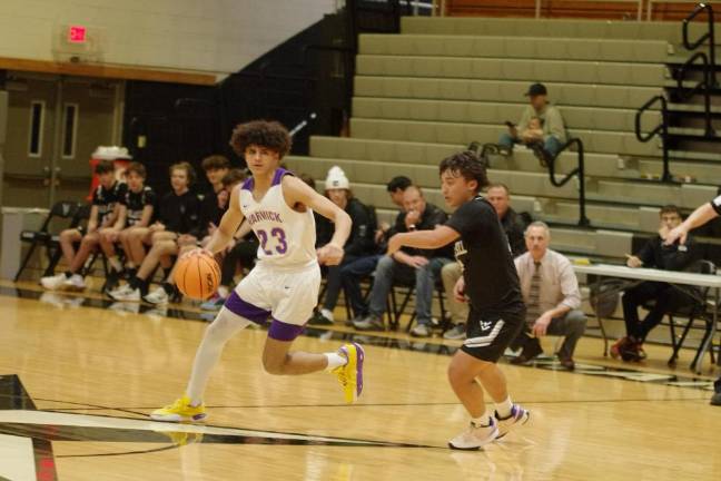 Warwick Valley's Jaedyn Rodriguez handles the ball while covered by Wallkill Valley's Dylan Klackowski.