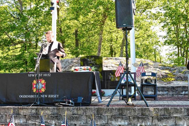 Photos: Memorial Day service in Ogdensburg Father Przemek Gawlik of St. Thomas Catholic Church speaks during the service.