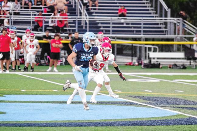 Football roundup: Vernon shuts out Dover <b>Sparta High School running back Brady Shagawat on a run in the game against Lakeland at home Friday, Sept. 5. He scored two touchdowns and the Spartans won, 34-7. (Photos by George Leroy Hunter)</b>