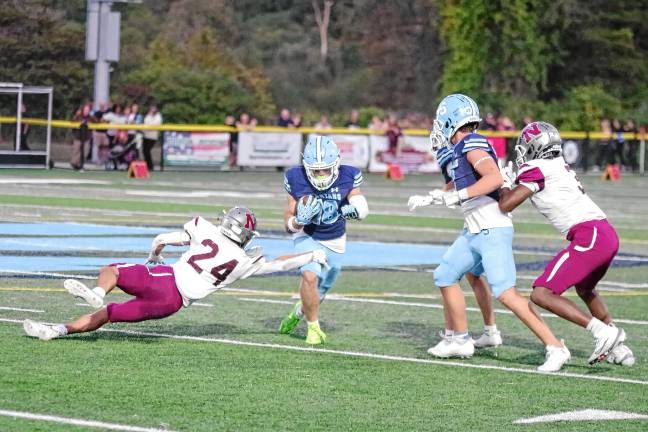 High Point remains undefeated <b>SN4 Sparta ball carrier Christian Brevig runs toward an opening.</b>
