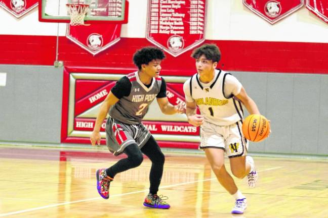 West Milford's Tyler Liguori is covered by High Point's Jacob Guinta. Liquori scored 10 points.