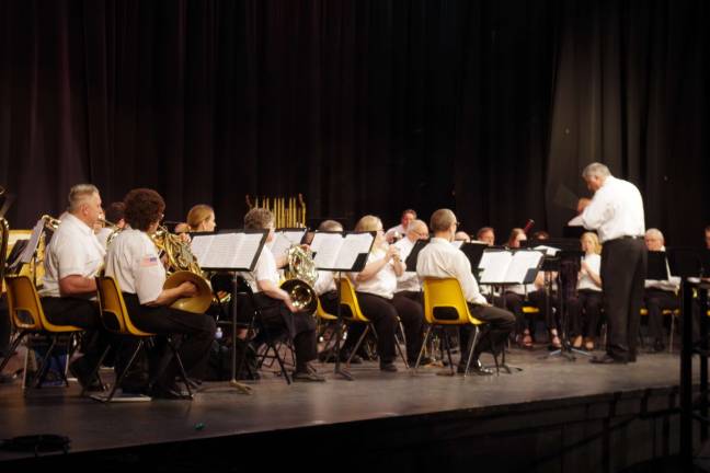 Michael Roth is shown conducting the Oakland-based North Jersey Concert Band during Sunday's free concert.