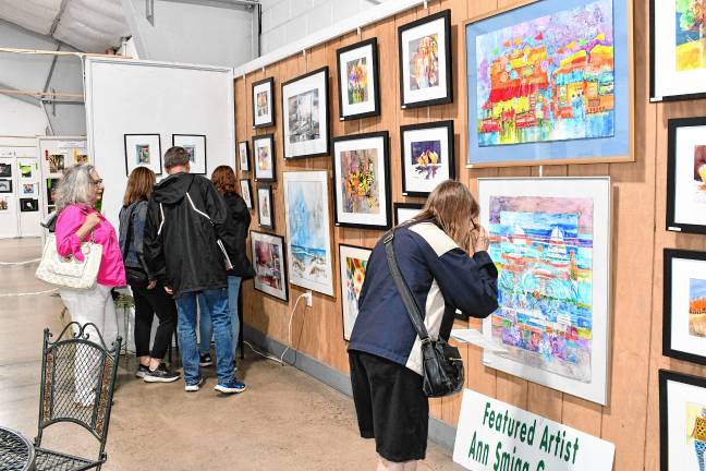 Photos: Meet the Artists Reception at State Fair <b>Residents look at the Art in Sussex County show during a Meet the Artists reception Thursday evening, July 31 in the Richards Building at the Sussex County Fairgrounds in Augusta. (Photos by Maria Kovic)</b>