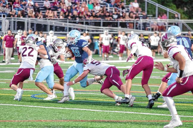 High Point remains undefeated <b>SN1 Sparta ball carrier Brady Shagawat on the run in the first half of the game against Newton on Friday, Sept. 19. He made three touchdowns and rushed for 96 yards. The Spartans won, 35-20. (Photos by George Leroy Hunter)</b>