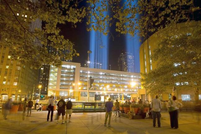 Towers of light mark the Manhattan sky (Photo by Robert G. Breese)