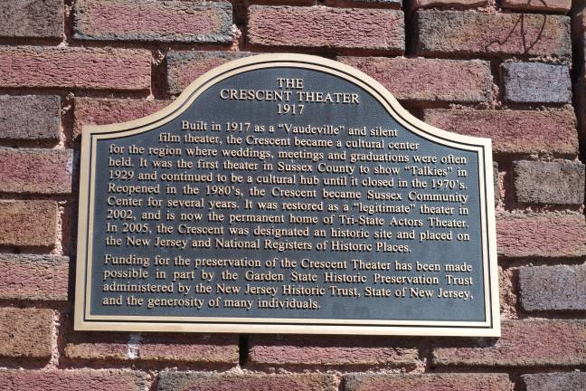 A plaque on the outside wall of the Cornerstone Playhouse in Sussex.