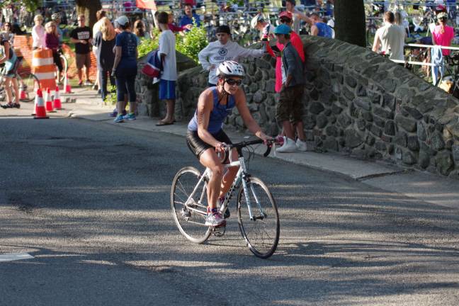 Kyla Kelly, 37, of Sparta, was the second place finisher in the female 35-39 category with a triathlon time of 1:26:57.47.