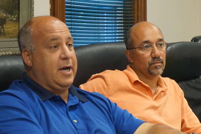 Mayor Steve Ciasullo and Councilman David Astor discuss and listen to engineers from Budzynski and olieman at the July 13 Borough Council meeting.