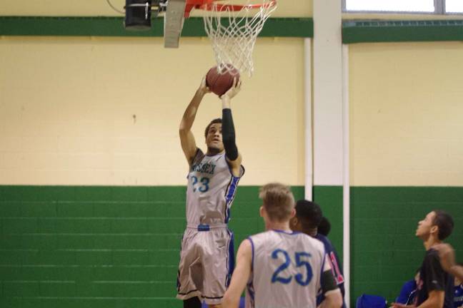 SCCC falls in basketball showdown Sussex County Skylander center Marcus Swinson goes up for a shot.