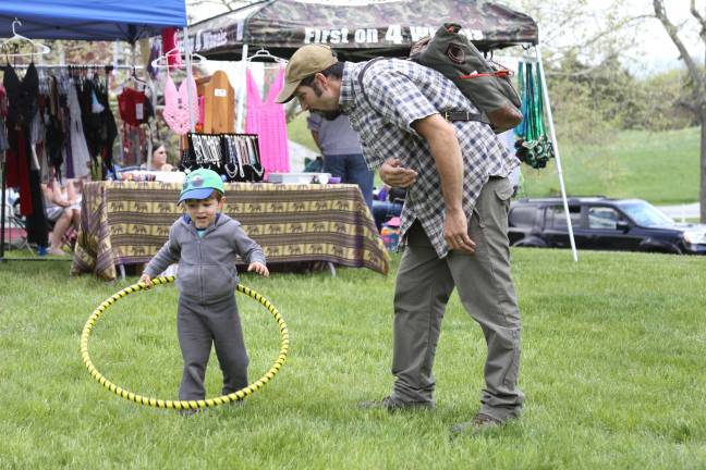 Medicine Wheel celebrated at Lusscroft Farm Aidan and Austin D'Almeida of Sussex try out the hand made hula hoops at the Medicine Wheel on Saturday.