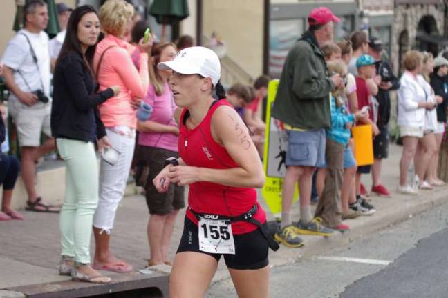 Swim, cycle, run Megan Smith, 28, of Sussex, finished in 3rd place in the female 25 to 29 age category with a time of 1:23:00.97.