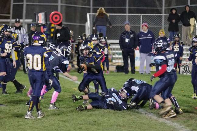 Milk Bowl makes a difference All-day youth football event brings community together Sparta Blue Pony and Vernon Pony battle on the field. Sparta won the game by the score of 20-7.