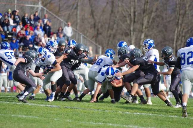 A Kittatinny ball carrier tries to break through the Wallkill Valley defense.