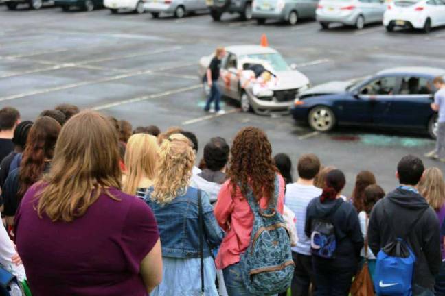 High Point school stages mock accident Scene of a mock drunk driving accident at High Point High School May 15.