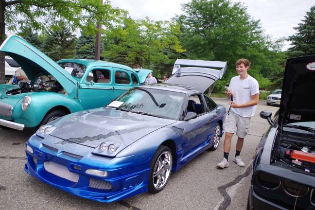 Classic car show to benefit Parkinson's research Seventeen year old Andrew Van Hook of Newton stands next to his customized 1991 Nissan 240 SX low rider.